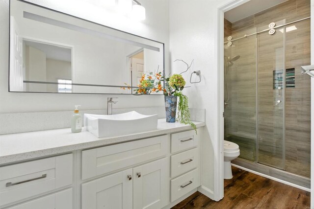 2344 Greenbriar Dr Unit A, Chula Vista, CA 91915 - full bath featuring vanity, a stall shower, and wood finished floors