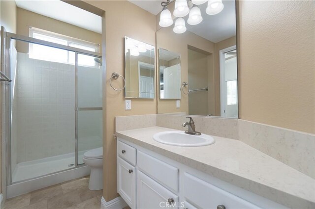 30528 Covecrest Cir, Menifee, CA 92584 - bathroom featuring a stall shower, vanity, and a chandelier