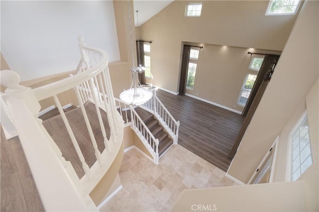 30528 Covecrest Cir, Menifee, CA 92584 - staircase with plenty of natural light and high vaulted ceiling