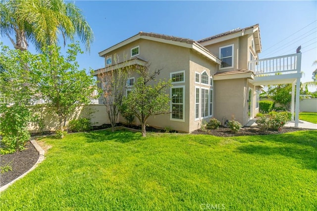 30528 Covecrest Cir, Menifee, CA 92584 - view of side of property featuring stucco siding and a balcony
