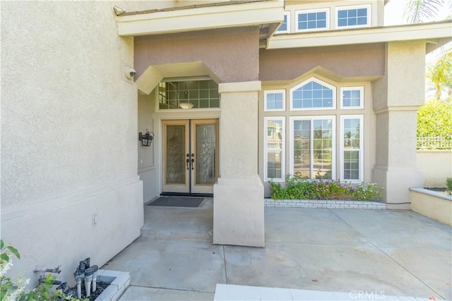 30528 Covecrest Cir, Menifee, CA 92584 - doorway to property with french doors and stucco siding