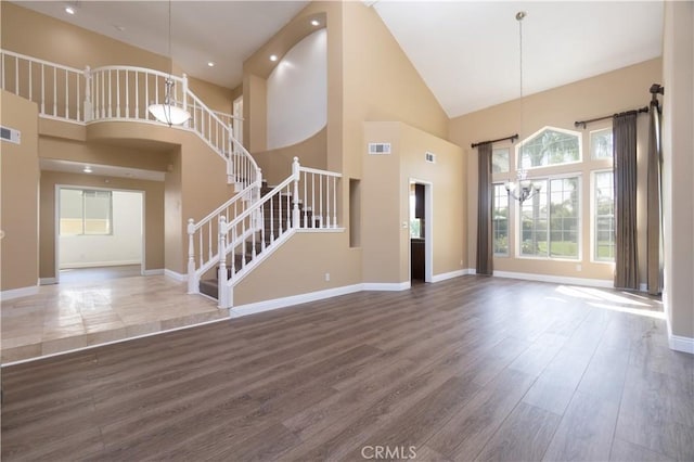 30528 Covecrest Cir, Menifee, CA 92584 - unfurnished living room with stairway, wood finished floors, and high vaulted ceiling