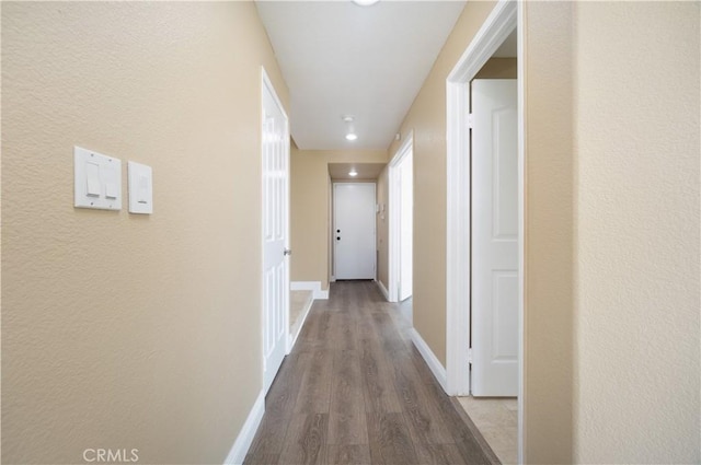 30528 Covecrest Cir, Menifee, CA 92584 - hallway featuring dark wood-style flooring and a textured wall