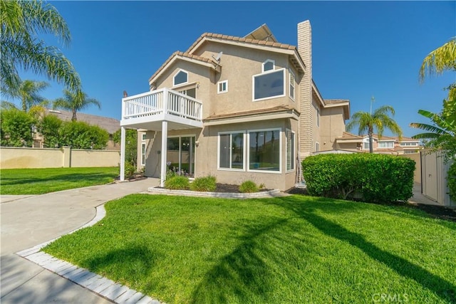30528 Covecrest Cir, Menifee, CA 92584 - back of house with a balcony, a chimney, stucco siding, and a tile roof