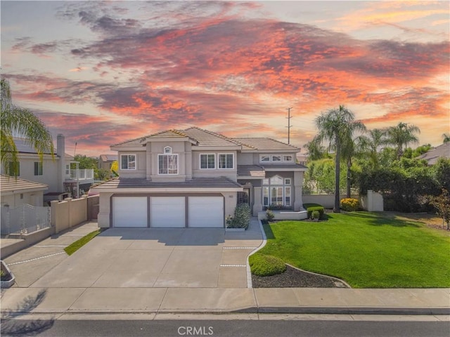 30528 Covecrest Cir, Menifee, CA 92584 - view of front of property featuring stucco siding, a garage, concrete driveway, and a tiled roof