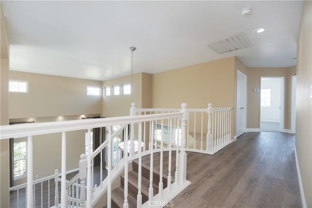 30528 Covecrest Cir, Menifee, CA 92584 - hallway with an upstairs landing, wood finished floors, and recessed lighting