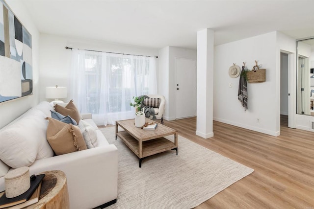 13754 Mango Dr Unit 111, Del Mar, CA 92014 - living room with wood finished floors and baseboards