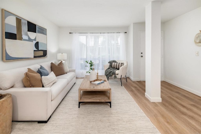 13754 Mango Dr Unit 111, Del Mar, CA 92014 - living room featuring wood finished floors and baseboards