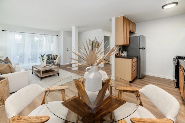 13754 Mango Dr Unit 111, Del Mar, CA 92014 - living room with light wood-style floors and baseboards