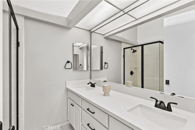 5151 Balboa Blvd Unit 303, Encino, CA 91316 - bathroom featuring a stall shower and double vanity