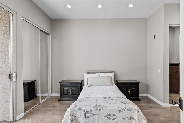 5151 Balboa Blvd Unit 303, Encino, CA 91316 - bedroom featuring wood finished floors, recessed lighting, and a closet