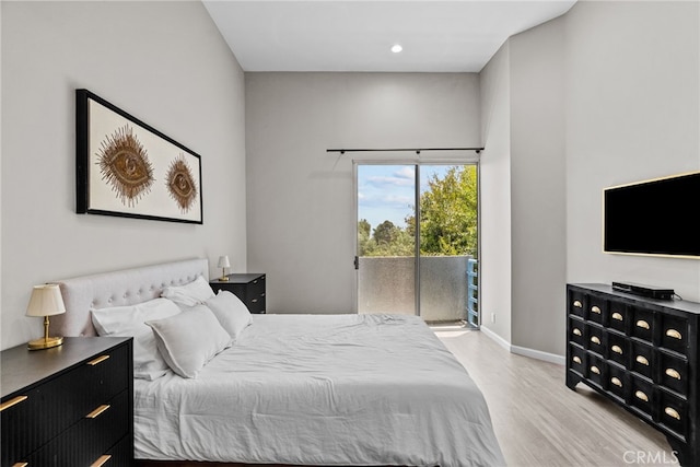5151 Balboa Blvd Unit 303, Encino, CA 91316 - bedroom featuring access to exterior, wood finished floors, and recessed lighting