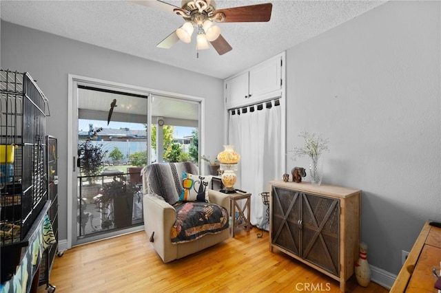 708 S Vecino Dr, Glendora, CA 91740 - sitting room with light wood-style floors, a ceiling fan, and a textured ceiling