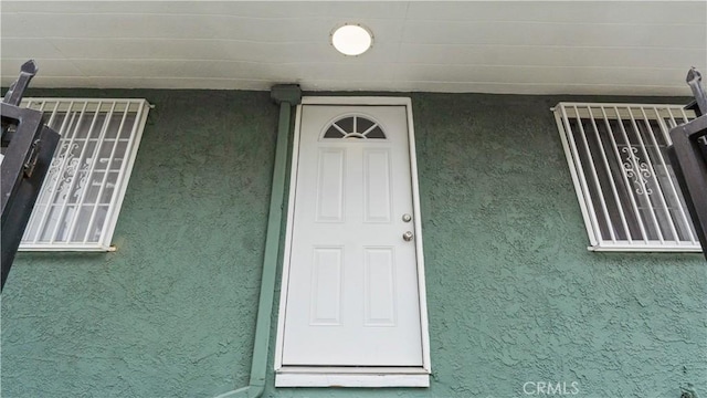 4348 Lima St, Los Angeles, CA 90011 - entrance to property featuring stucco siding