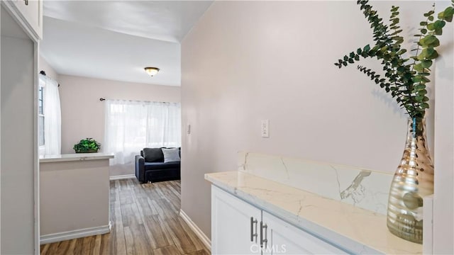 4348 Lima St, Los Angeles, CA 90011 - hallway with light wood-style floors and baseboards