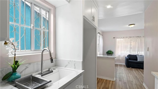 4348 Lima St, Los Angeles, CA 90011 - full bath with wood finished floors and a garden tub
