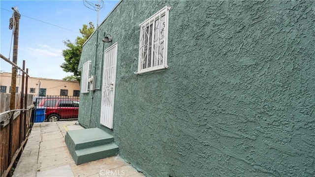 4348 Lima St, Los Angeles, CA 90011 - view of side of home featuring stucco siding