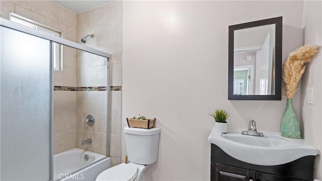 4348 Lima St, Los Angeles, CA 90011 - bathroom featuring vanity and shower / bath combination with glass door