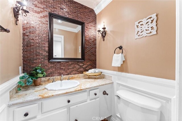25 Westbrook Ln, Pomona, CA 91766 - bathroom featuring crown molding, vanity, and decorative backsplash