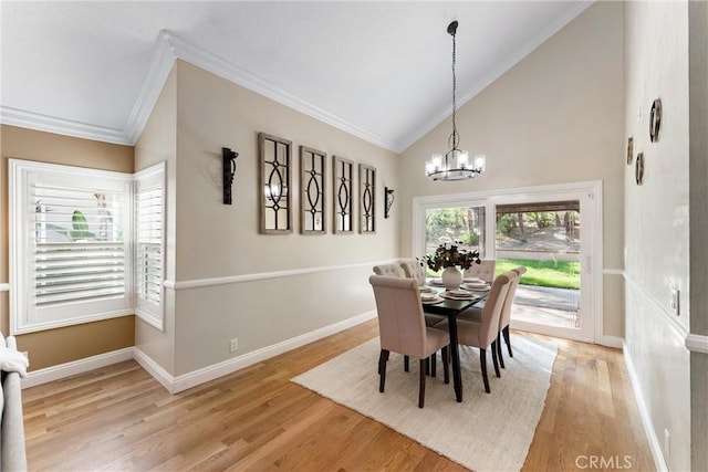 25 Westbrook Ln, Pomona, CA 91766 - dining space featuring ornamental molding, a chandelier, light wood-style floors, and high vaulted ceiling