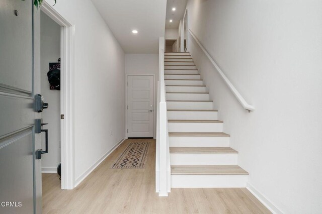 751 Winchester Dr, Oxnard, CA 93036 - staircase with wood finished floors and recessed lighting