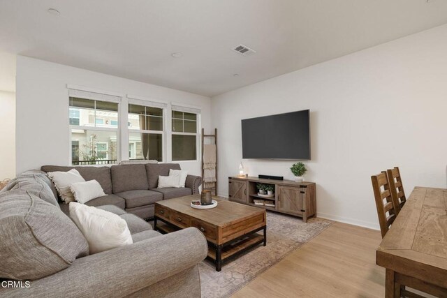 751 Winchester Dr, Oxnard, CA 93036 - living room with light wood-type flooring and baseboards