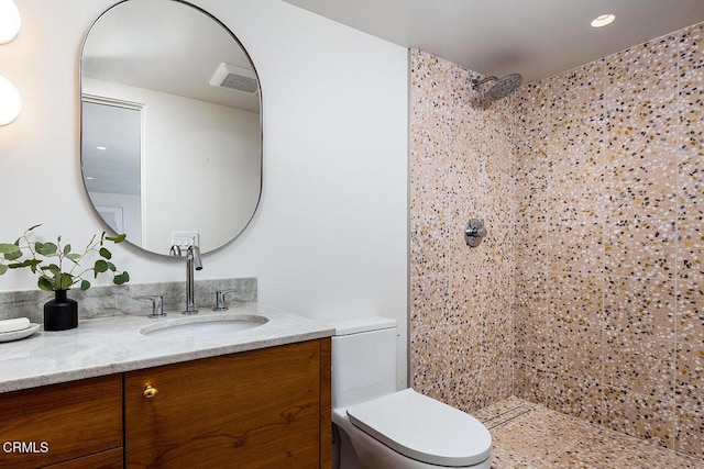 808 Inverness Dr, La Canada Flintridge, CA 91011 - full bathroom featuring a tile shower, vanity, and recessed lighting