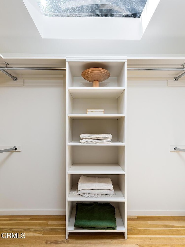 808 Inverness Dr, La Canada Flintridge, CA 91011 - spacious closet featuring wood finished floors