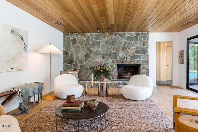 808 Inverness Dr, La Canada Flintridge, CA 91011 - living room with wood ceiling, a stone fireplace, and wood finished floors