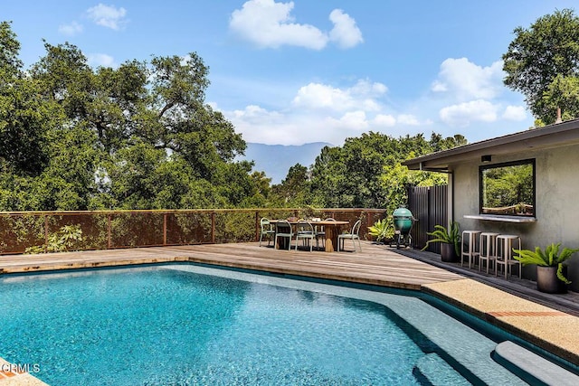 808 Inverness Dr, La Canada Flintridge, CA 91011 - view of pool with a deck with mountain view and outdoor dining area