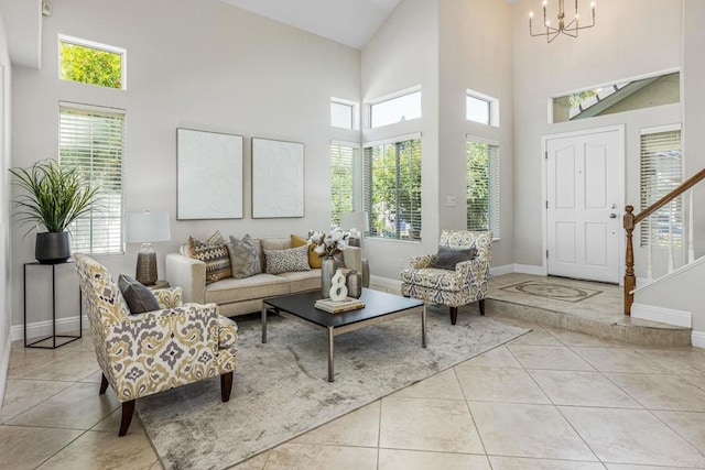 14136 Capewood Ln, San Diego, CA 92128 - tiled living room featuring a chandelier, a towering ceiling, and stairs