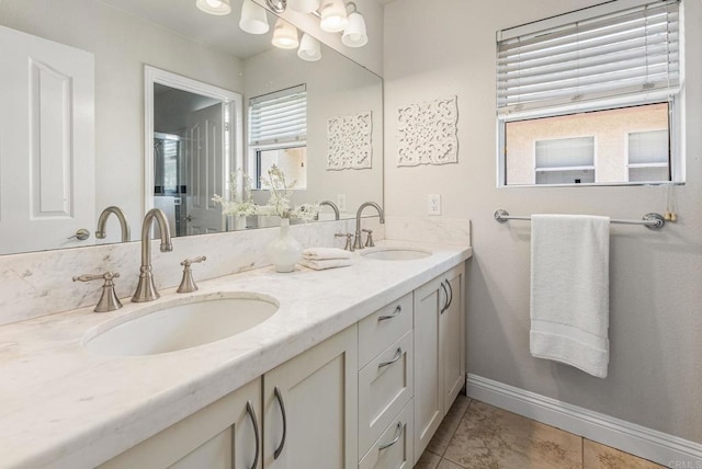 14136 Capewood Ln, San Diego, CA 92128 - bathroom featuring double vanity, tile patterned floors, and a chandelier