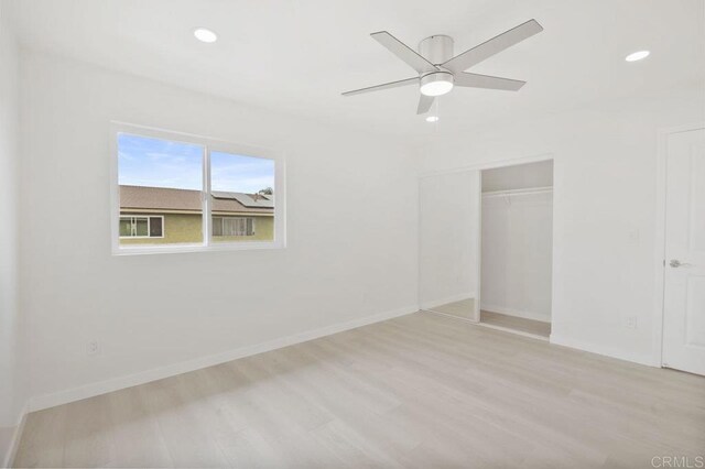 814 Hollister St Unit B, Otay Mesa, CA 92154 - unfurnished bedroom featuring a closet, wood finished floors, recessed lighting, and ceiling fan