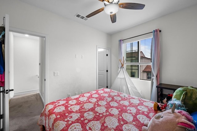 4376 Pacifica Dr Unit 2, Oceanside, CA 92056 - carpeted bedroom featuring baseboards and a ceiling fan