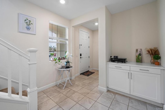 4376 Pacifica Dr Unit 2, Oceanside, CA 92056 - foyer entrance with stairway, light tile patterned floors, and recessed lighting