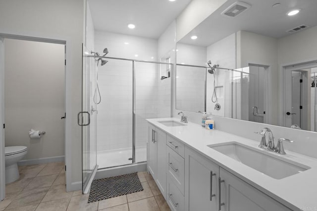4376 Pacifica Dr Unit 2, Oceanside, CA 92056 - bathroom with a stall shower, double vanity, tile patterned flooring, and recessed lighting