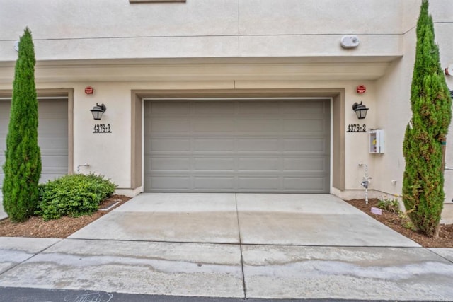 4376 Pacifica Dr Unit 2, Oceanside, CA 92056 - garage featuring driveway