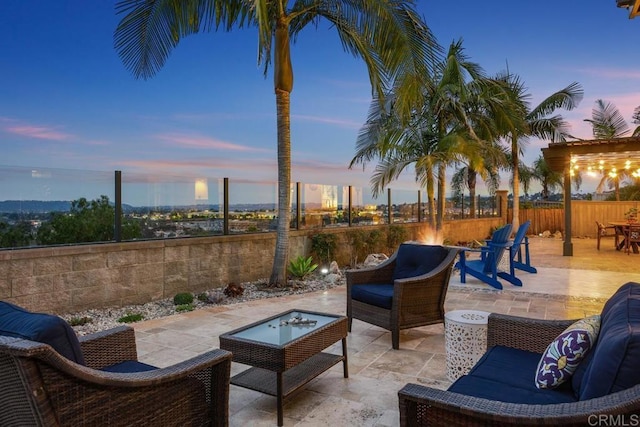7661 Sitio Algodon, Carlsbad, CA 92009 - patio terrace at dusk featuring a patio area and an outdoor hangout area