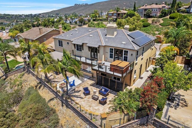 7661 Sitio Algodon, Carlsbad, CA 92009 - aerial perspective of suburban area featuring mountains