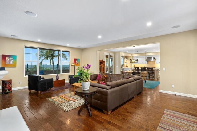 7661 Sitio Algodon, Carlsbad, CA 92009 - living area featuring wood-type flooring and recessed lighting