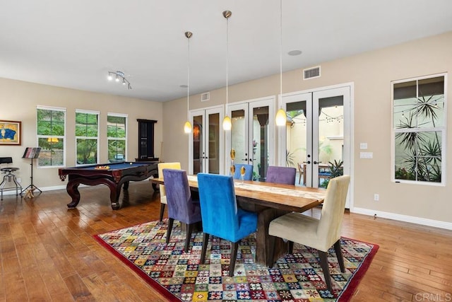 7661 Sitio Algodon, Carlsbad, CA 92009 - dining space featuring french doors, wood-type flooring, and billiards
