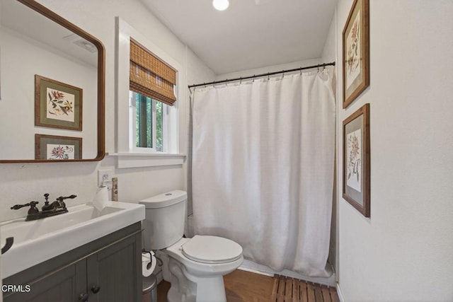 310 N Fulton St, Ojai, CA 93023 - full bathroom featuring vanity, wood finished floors, and curtained shower