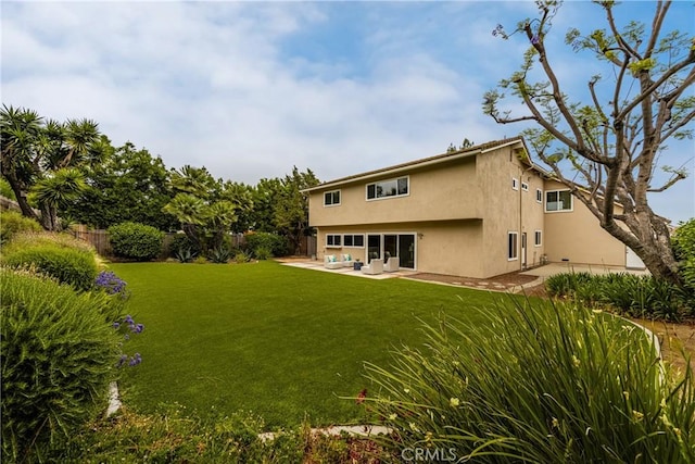 19795 Futura Dr, Yorba Linda, CA 92886 - rear view of property featuring a patio area, stucco siding, and a fenced backyard