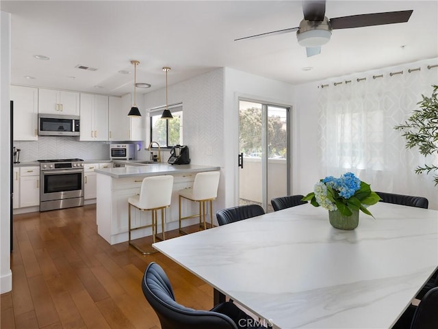 22477 Kent, Torrance, CA 90505 - dining space with dark wood-type flooring, ceiling fan, and recessed lighting
