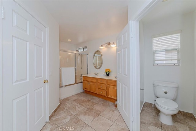 24646 Maple Ln, Harbor City, CA 90710 - bathroom featuring vanity and combined bath / shower with glass door