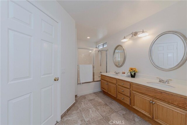 24646 Maple Ln, Harbor City, CA 90710 - full bath featuring double vanity, bath / shower combo with glass door, and tile patterned floors