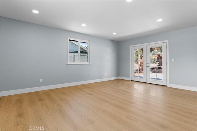 10352 Lincoln Ave, Hesperia, CA 92345 - spare room with french doors, recessed lighting, and light wood-style floors