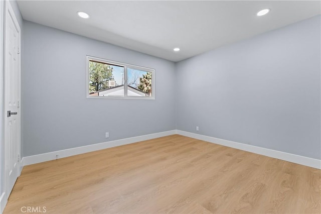 10352 Lincoln Ave, Hesperia, CA 92345 - empty room with light wood-style floors and recessed lighting