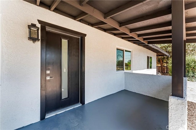 10352 Lincoln Ave, Hesperia, CA 92345 - doorway to property featuring stucco siding and a patio