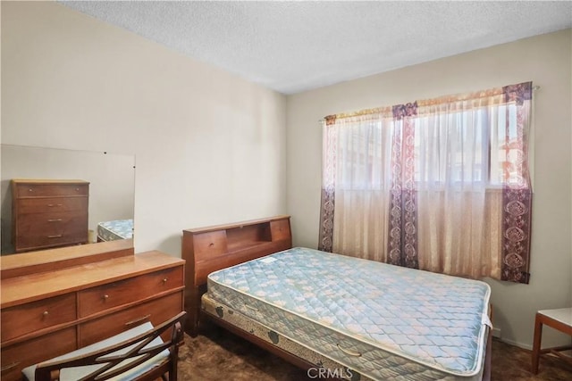 8707 Chester St, Paramount, CA 90723 - bedroom with a textured ceiling